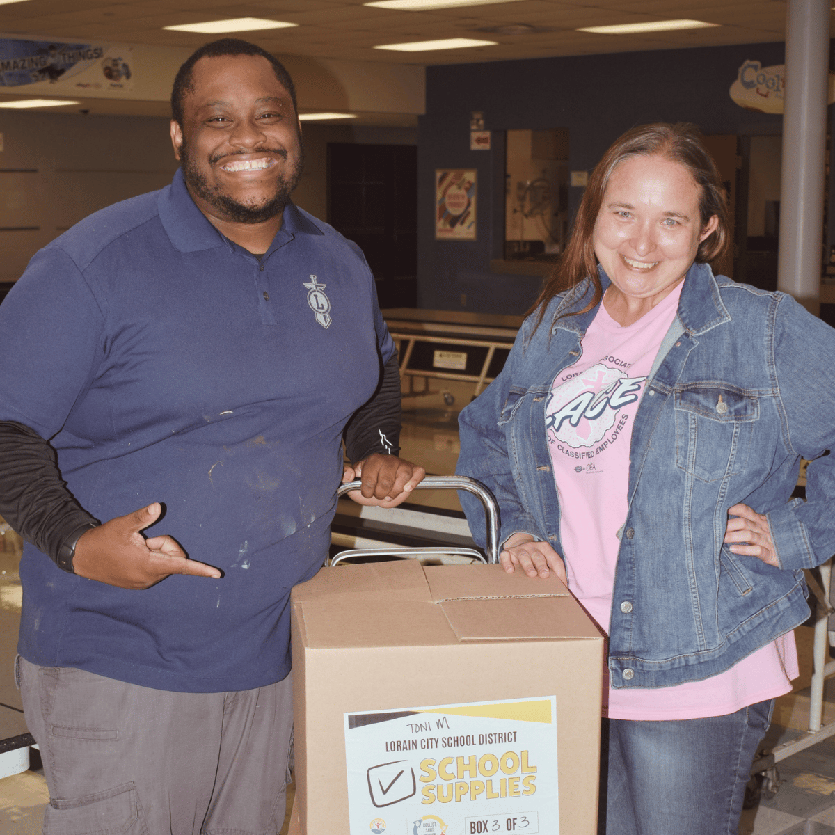 Toni Morrison staff receive school supplies.